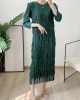 Pleated dress with tassel