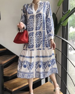 Reflection motif button dress