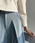 Flare pants with pleat