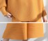 Pleated mockneck blouse and cropped pants set