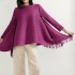 Pleated blouse with tassel