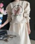 Butterfly statement pullover