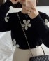 Flower applique knit pullover