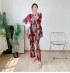 Pleated floral motif blouse and pants set