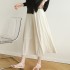 Pleated swing skirt