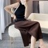 Pleated skirt with slit