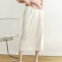 Pleated skirt with slit