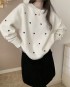 Heart motif knit pullover