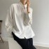 Blouse with pleated back