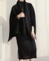 Pleated cape with tassel