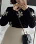 Flower applique knit pullover