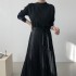 Pleated knit dress with sash