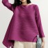 Pleated blouse with tassel