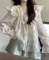 Floral ruffle blouse