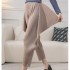 Pleated pants with ruffle