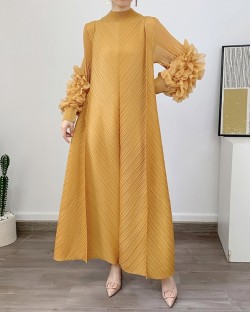 Pleated long dress with sheer sleeves