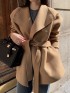 Open lapel coat with sash