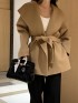 Open lapel coat with sash