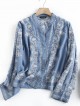 Intricate embroidery motif denim blouse