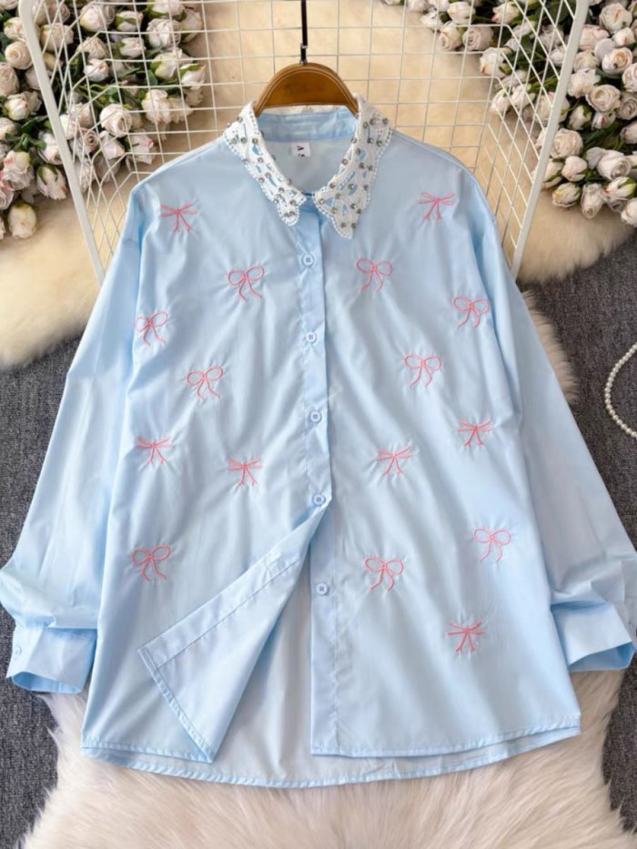 Bow motif button blouse