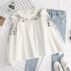 Floral embroidered babydoll blouse